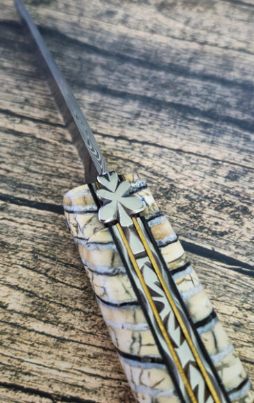 GC bee, sides and spring chiselled by hand